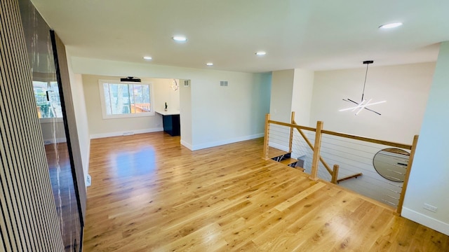 527 Northgate Rd, Lindenhurst, IL 60046 - unfurnished room featuring wood finished floors, recessed lighting, and baseboards