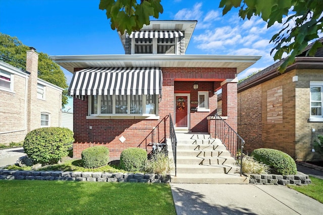view of front of property with brick siding