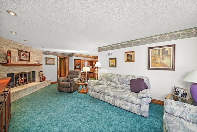 carpeted living area with a stone fireplace, a textured ceiling, and baseboards