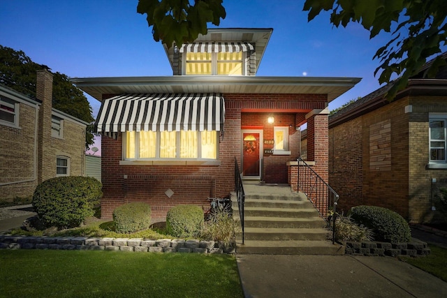 view of front of property with brick siding