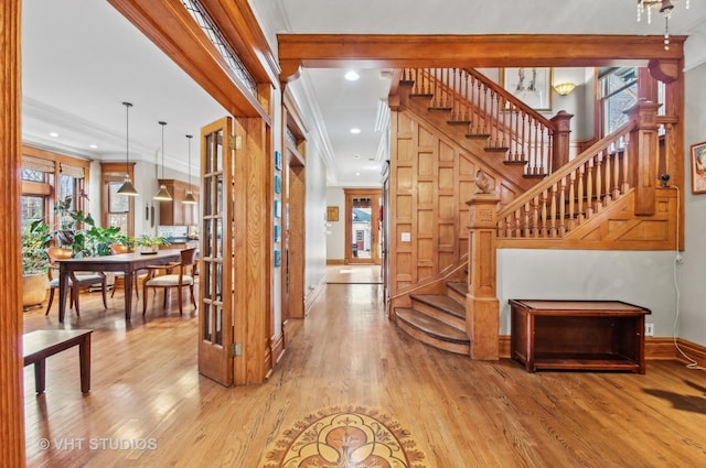 4752 N Beacon St, Chicago, IL 60613 - stairway featuring crown molding, plenty of natural light, wood finished floors, baseboards, and recessed lighting