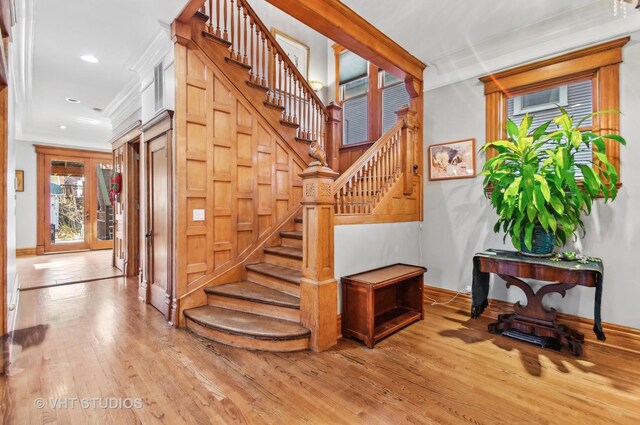 4752 N Beacon St, Chicago, IL 60613 - stairs featuring hardwood / wood-style floors, baseboards, recessed lighting, and crown molding