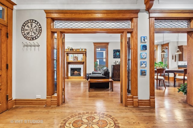 4752 N Beacon St, Chicago, IL 60613 - hallway with wood finished floors, ornamental molding, and baseboards