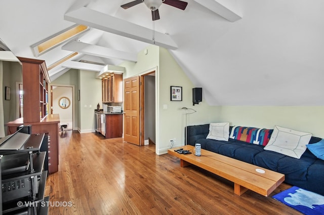 4752 N Beacon St, Chicago, IL 60613 - living area with wood finished floors, a ceiling fan, and baseboards