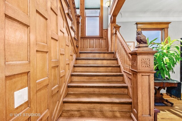4752 N Beacon St, Chicago, IL 60613 - staircase featuring wood finished floors