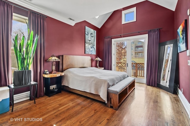 4752 N Beacon St, Chicago, IL 60613 - bedroom featuring access to exterior, wood finished floors, and high vaulted ceiling