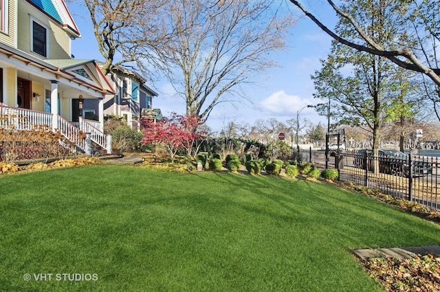 4752 N Beacon St, Chicago, IL 60613 - view of yard with a porch and stairway