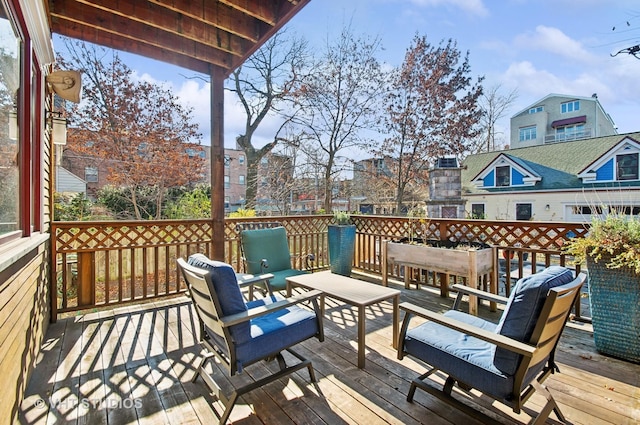 4752 N Beacon St, Chicago, IL 60613 - wooden terrace featuring outdoor lounge area