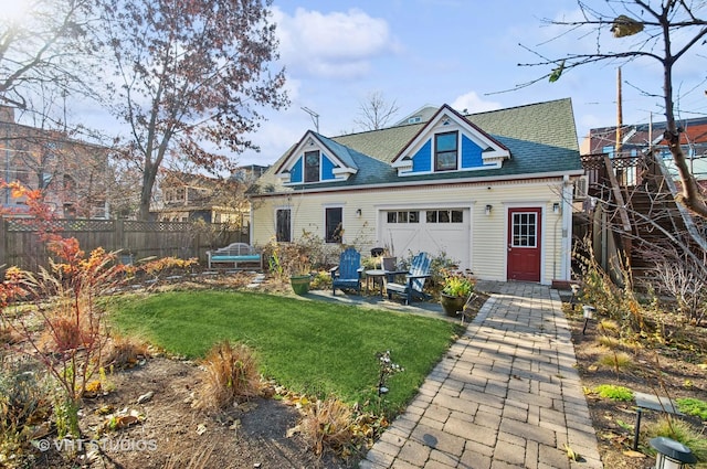 4752 N Beacon St, Chicago, IL 60613 - rear view of house featuring roof with shingles