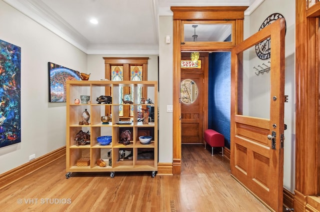 4752 N Beacon St, Chicago, IL 60613 - foyer with wood finished floors, baseboards, and crown molding