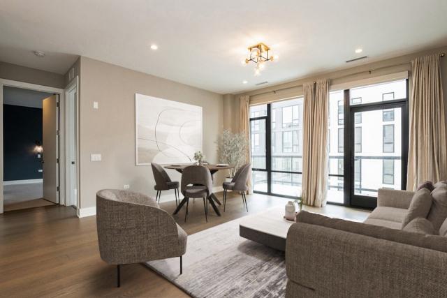 1701 W Webster Ave Unit 611, Chicago, IL 60614 - living area with wood finished floors, baseboards, recessed lighting, and a chandelier