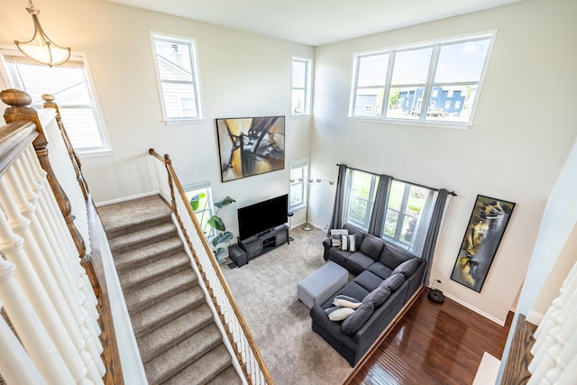 3080 Wickenden Ave, Elgin, IL 60124 - living room with healthy amount of natural light, baseboards, and a high ceiling