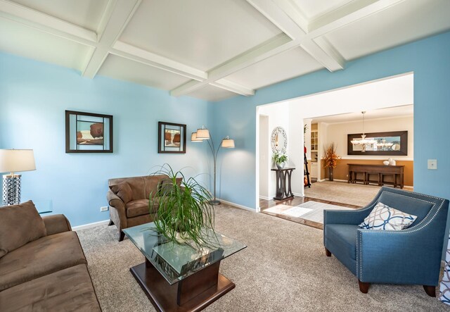 3080 Wickenden Ave, Elgin, IL 60124 - carpeted living room with coffered ceiling, beam ceiling, baseboards, and a chandelier
