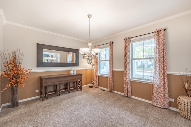 3080 Wickenden Ave, Elgin, IL 60124 - carpeted dining area featuring a chandelier, ornamental molding, and baseboards