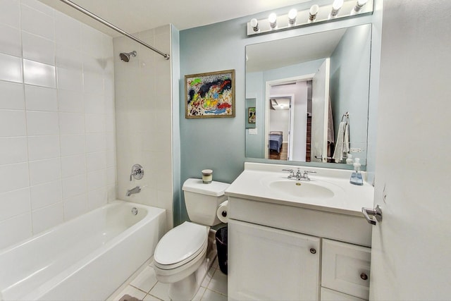 full bath with toilet, vanity,  shower combination, and tile patterned flooring