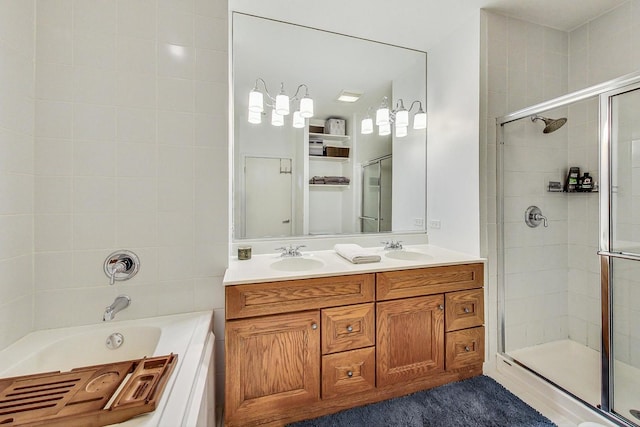 full bath featuring a stall shower, a bath, and double vanity