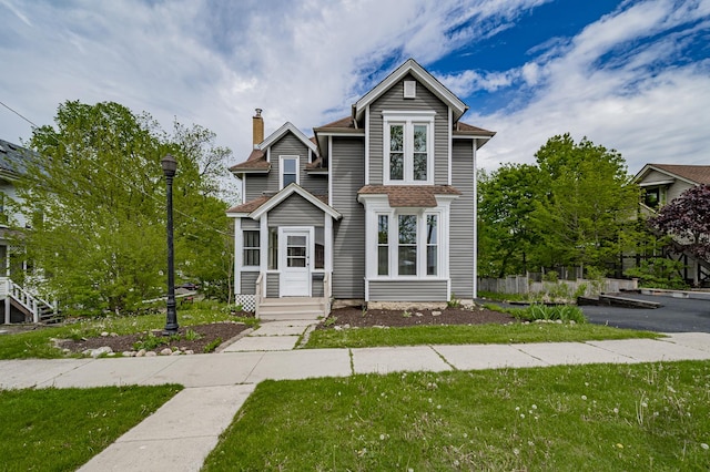 125 Arbor Ave, West Chicago, IL 60185 - view of front of home with a chimney