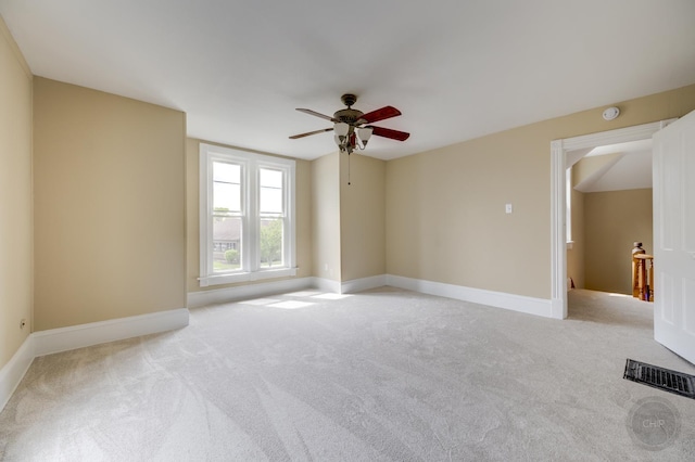 125 Arbor Ave, West Chicago, IL 60185 - spare room with a ceiling fan, light carpet, and baseboards