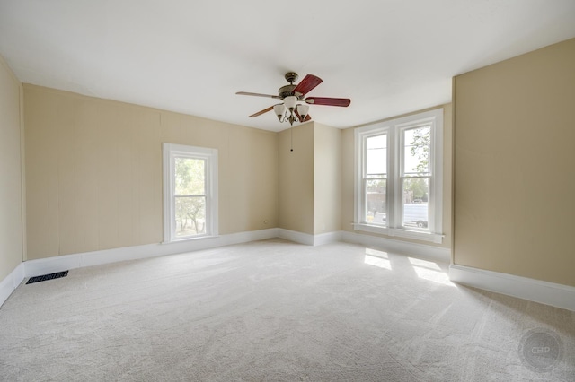 125 Arbor Ave, West Chicago, IL 60185 - empty room with ceiling fan, light carpet, and baseboards