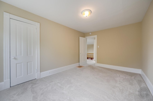 125 Arbor Ave, West Chicago, IL 60185 - unfurnished bedroom featuring carpet and baseboards
