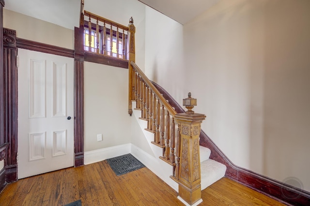 125 Arbor Ave, West Chicago, IL 60185 - stairs featuring wood finished floors and baseboards