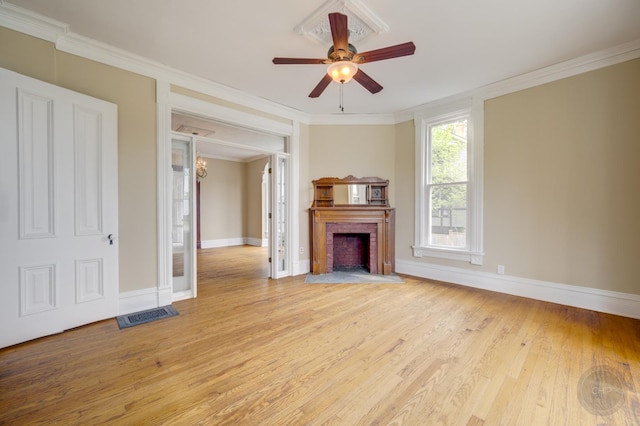 125 Arbor Ave, West Chicago, IL 60185 - unfurnished living room with crown molding, light wood-style floors, baseboards, ceiling fan, and a fireplace with flush hearth