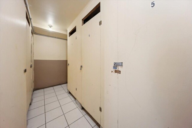 6357 W Addison St Unit Gse, Chicago, IL 60634 - hallway featuring light tile patterned floors