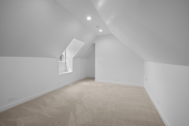 8317 S Constance Ave, Chicago, IL 60617 - bonus room featuring recessed lighting, vaulted ceiling, light colored carpet, and baseboards