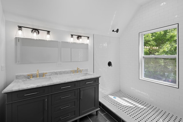 8317 S Constance Ave, Chicago, IL 60617 - bathroom with lofted ceiling, a tile shower, tile patterned flooring, and double vanity