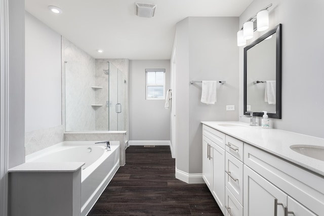 2234 Weatherbee Ln, Naperville, IL 60563 - bathroom with a stall shower, double vanity, a garden tub, wood finished floors, and recessed lighting