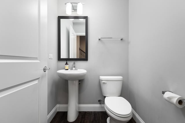 2234 Weatherbee Ln, Naperville, IL 60563 - half bathroom featuring baseboards and wood finished floors