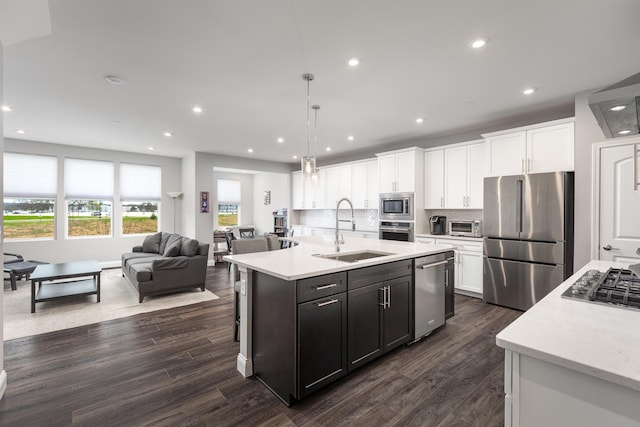 2234 Weatherbee Ln, Naperville, IL 60563 - kitchen with appliances with stainless steel finishes, white cabinetry, open floor plan, dark wood finished floors, and recessed lighting