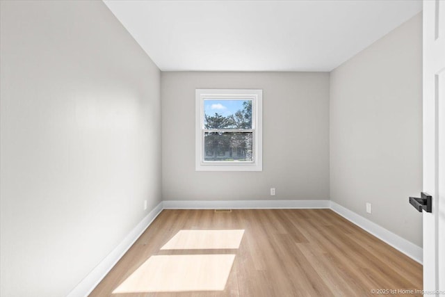 266 Merrill Ave, Calumet City, IL 60409 - empty room featuring light wood-style floors and baseboards