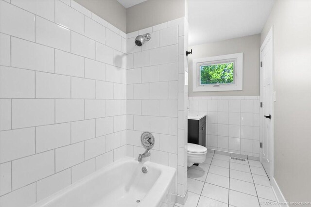 266 Merrill Ave, Calumet City, IL 60409 - bathroom featuring tile walls, toilet,  shower combination, tile patterned floors, and vanity