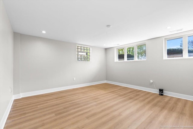 266 Merrill Ave, Calumet City, IL 60409 - unfurnished room featuring light wood finished floors, baseboards, and recessed lighting