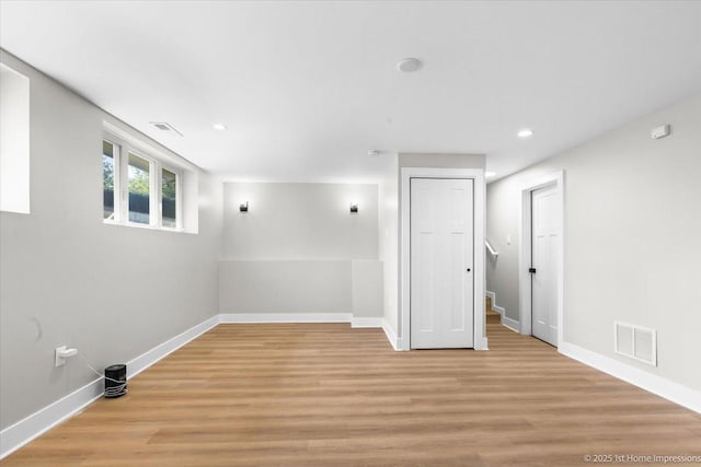 266 Merrill Ave, Calumet City, IL 60409 - basement with light wood finished floors, baseboards, recessed lighting, and stairs