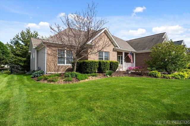 1123 Redbud Ln, Sugar Grove, IL 60554 - view of front of property with brick siding and a front lawn
