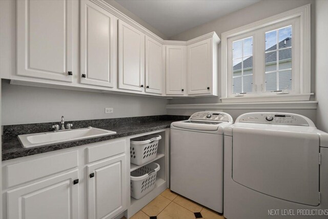 1123 Redbud Ln, Sugar Grove, IL 60554 - laundry area with separate washer and dryer, cabinet space, and light tile patterned floors