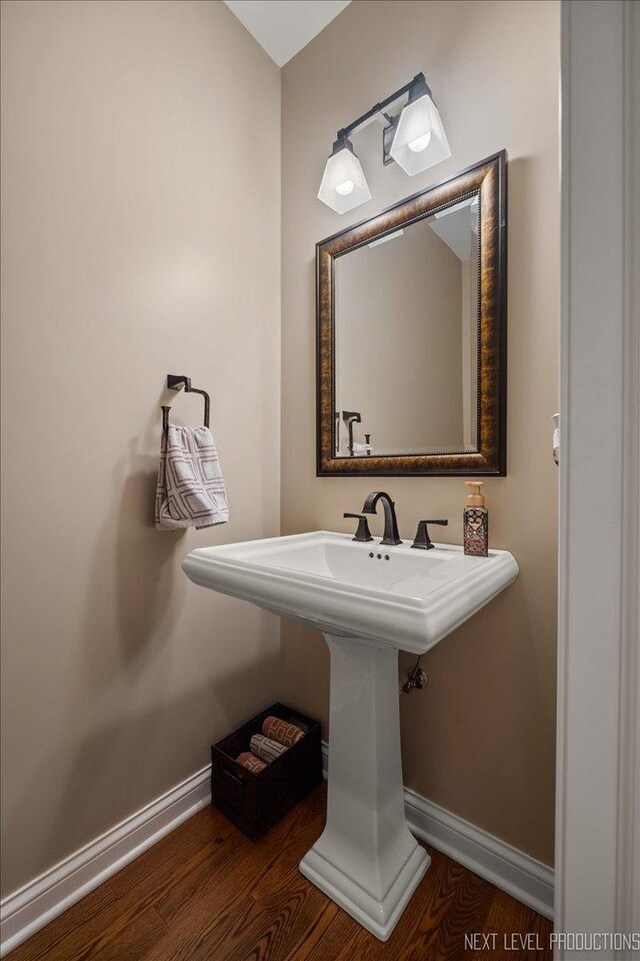 1123 Redbud Ln, Sugar Grove, IL 60554 - bathroom with wood finished floors and baseboards