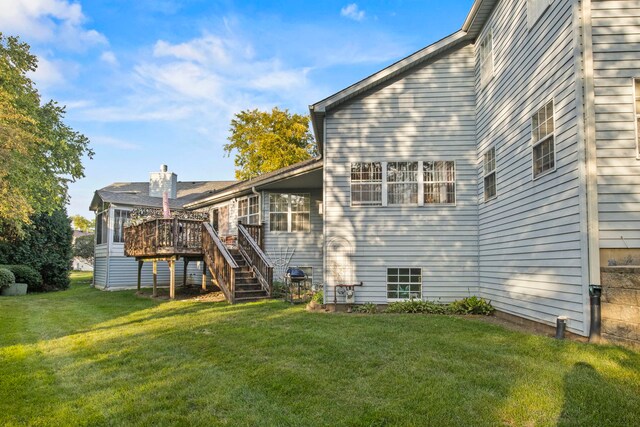 21220 Silktree Cir, Plainfield, IL 60544 - rear view of house featuring a wooden deck, stairway, and a lawn