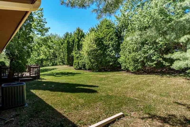 5718 Tasselbury Close, Rockford, IL 61114 - view of green lawn featuring central AC
