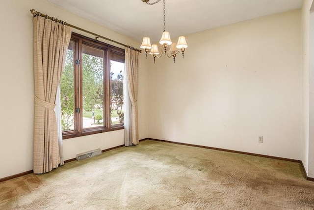5718 Tasselbury Close, Rockford, IL 61114 - carpeted empty room with healthy amount of natural light, a chandelier, and baseboards
