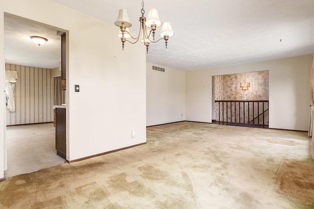 5718 Tasselbury Close, Rockford, IL 61114 - carpeted empty room with a chandelier and baseboards
