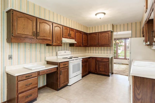 5718 Tasselbury Close, Rockford, IL 61114 - kitchen with wallpapered walls, electric range, light flooring, and light countertops