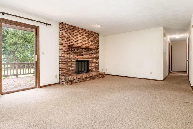 5718 Tasselbury Close, Rockford, IL 61114 - unfurnished living room with carpet, baseboards, and a fireplace