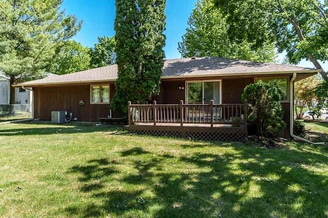 5718 Tasselbury Close, Rockford, IL 61114 - rear view of house with a deck, a yard, and central air condition unit