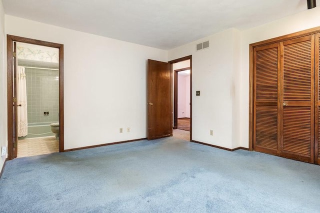 5718 Tasselbury Close, Rockford, IL 61114 - unfurnished bedroom featuring carpet flooring, a closet, baseboards, and ensuite bathroom