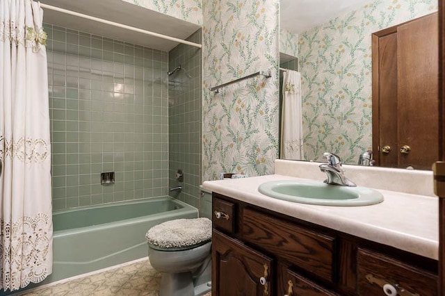 5718 Tasselbury Close, Rockford, IL 61114 - full bathroom featuring wallpapered walls, shower / bath combo, vanity, and toilet