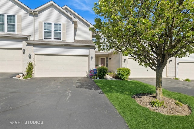 view of front of home featuring driveway and an attached garage