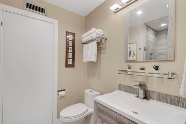 241 E Burlington St Unit C, Riverside, IL 60546 - bathroom featuring toilet and vanity